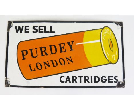 A reproduction enamel advertising sign ' We Sell Purdy London Cartridges', 21 x 37cm