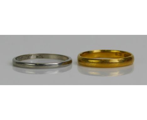 A 22 K Gold Plain Wedding Band (size M.5, London hallmarks, 2.74g) and a 10K white gold plain wedding band (size P, 1.26g)