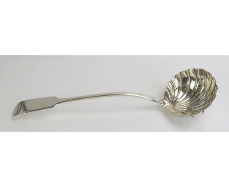 A Victorian silver Fiddle pattern soup ladle, maker's mark worn, London, 184, with shell-shaped bowl, 33cm long, 181gms, 5.86