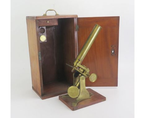 Baker, 244 High Holborn, London, a lacquered all brass monocular microscope, with rack and pinion focussing, fixed stage, hav