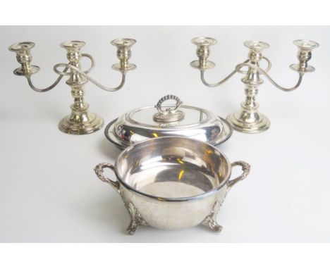 A pair of plated twin branch candelabra, a plated entree dish and cover, serving dish.