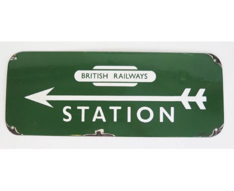 A reproduction enamel advertising sign 'British Railways Station', 18 x 46cm.