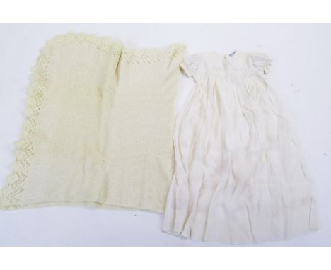 A collection of assorted garments and linen including cut work decorated petticoats, blouse, silk night gown and other items