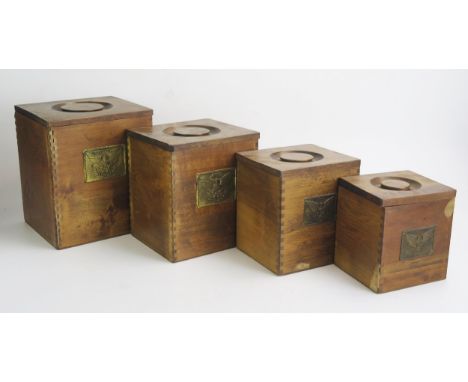 A set of four Chinese rectangular hardwood graduated storage boxes and covers.