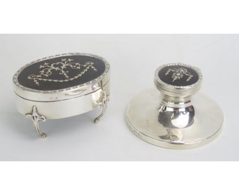 A George V silver and tortoiseshell trinket box, maker Deakin &amp; Francis Ltd, Birmingham, 1911, the oval hinged lid with p