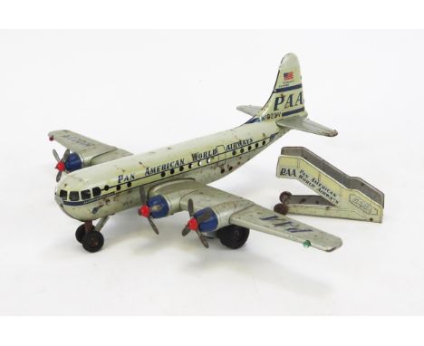 Gama PAA Strato Clipper Tinplate Battery Operated Airplane in white and silver with blue and red accents, friction drive whee