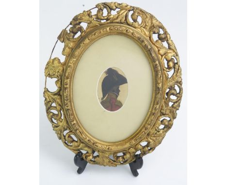 A late 18th century miniature silhouette of an Army officer,  with red tunic and bicorn hat, 8 x 5cm, F &amp; G.