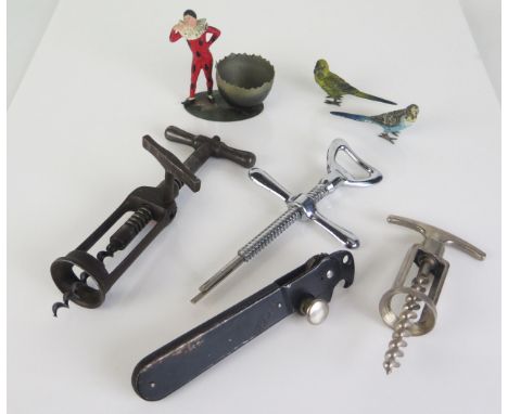 A late Victorian steel 'Lund type' rack and pinion corkscrew, together with two other corkscrews a tin opener , two painted m