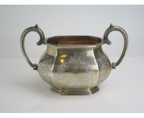 A Victorian silver twin handled sugar basin, maker Richard Pearce & George Burrows, London, 1841, of lozenge shaped outline, 