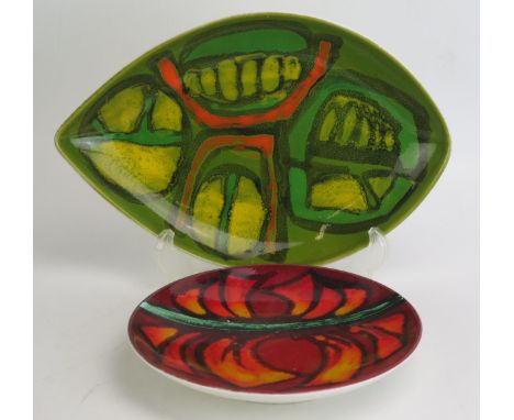 A Poole pottery 'Delphis' plate, 20cm diameter together with another Delphis oval serving dish, 30cm wide. (2)