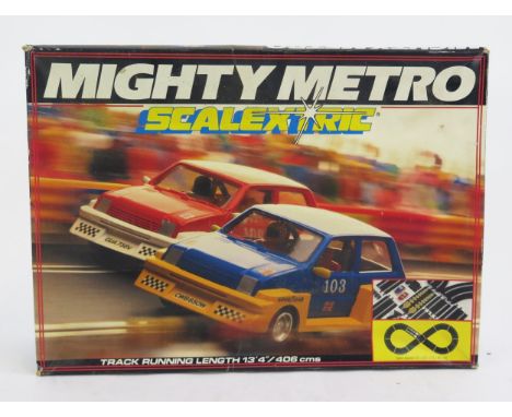 Scalextric C880 Mighty Metro Racing Set with "Total" &amp; "Valvoline" branded cars - lovely condition unused set with very g