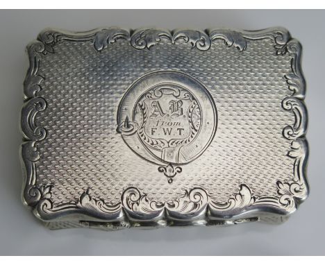 A Victorian silver snuff box, maker William Dudley, Birmingham, 1860, of rectangular initialled and dated, of rectangular out