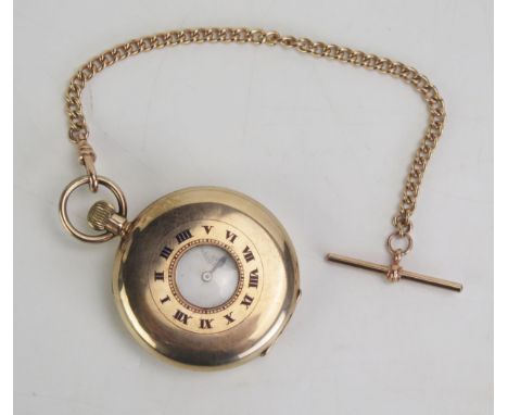 A 9ct Gold Half Hunter Pocket Watch, the 49mm case with keyless movement and enamel dial with Roman numerals, 9ct gold inner 