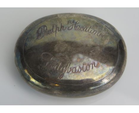 A late Victorian silver snuff box, maker George Unite &amp; Sons, Birmingham, 1899, inscribed, of oval outline with flip lid,