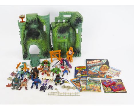 Mattel He Man Masters of The Universe Collection including Castle Greyskull, figures, accessories, books