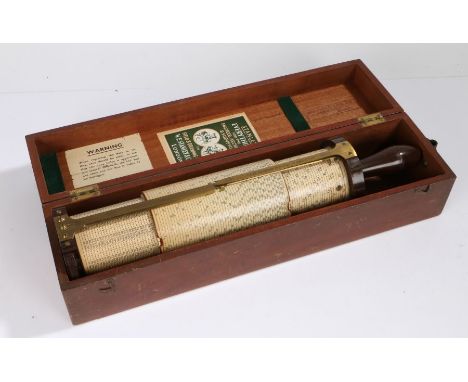 Cased Stanley Fuller spiral slide rule calculator with scale of Sines &amp; Logs