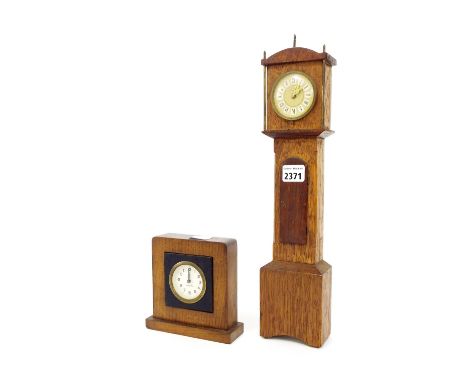 Oak miniature longcase clock, 16.5" high; also a German Mercedes small oak mantel clock, 6" high (2)