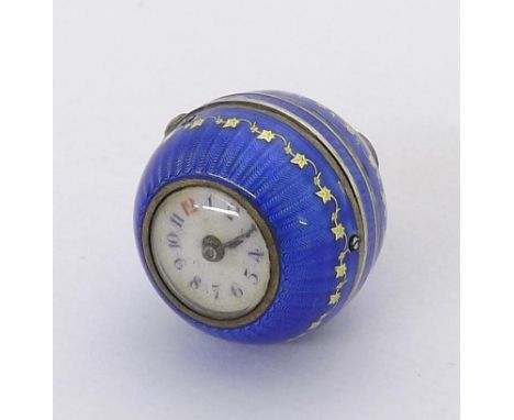 Swiss cylinder silver-gilt and blue guilloche enamel ball pendant watch, import hallmarks for London 1931, the dial with red 