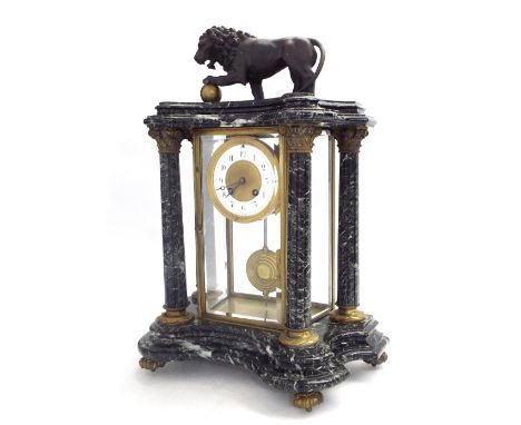 French dark green marble two train four glass mantel clock, the Mougin movement striking on a bell, the 3.5" white chapter ri