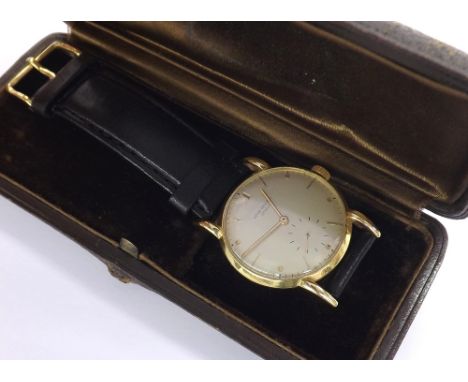 Patek Philippe 1950s 18k gentleman's wristwatch, ref. 1595, the silvered dial with Roman numerals, baton and dot markers with