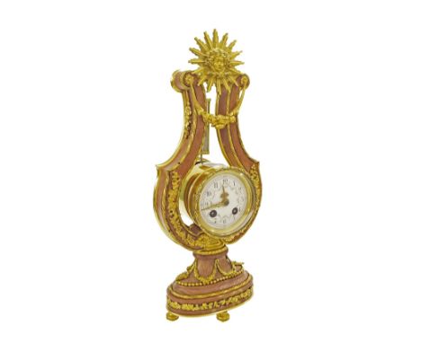 French pink marble and ormolu mounted two train lyre mantel clock, the movement with gridiron pendulum striking on a bell, th