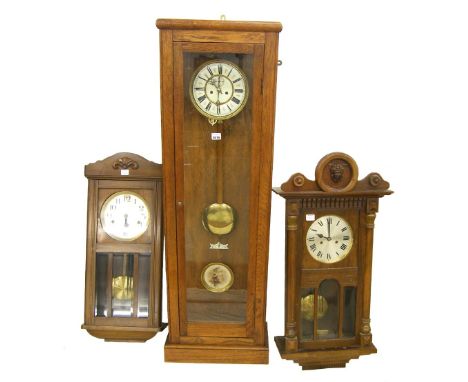Large oak double weight regulator wall clock, the 7" circular dial with central subsidiary seconds dial within a long glazed 