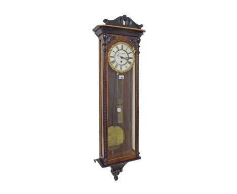 Good rosewood and ebonised Vienna single weight regulator wall clock, the 6" chapter ring enclosing a recessed centre signed 