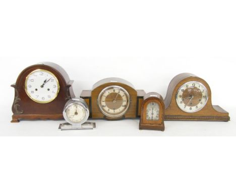 Mahogany two train mantel clock striking on a gong, 11" high; also two three train mantel clocks and two small mantel clocks 