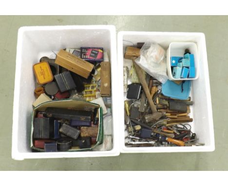 Two boxes containing a quantity of watchmakers tools and accessories etc