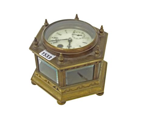 Reproduction brass table clock, the 3.75" cream dial with subsidiary seconds dial supported upon a hexagonal bevelled glazed 