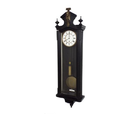 Ebonised single weight Vienna regulator wall clock, the 6.25" dial with subsidiary seconds dial, within a glazed case, 44" hi