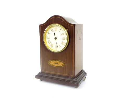 Small mahogany inlaid mantel clock timepiece, with V.A.P. movement, the 2.25" circular dial within a wavy arched stepped case