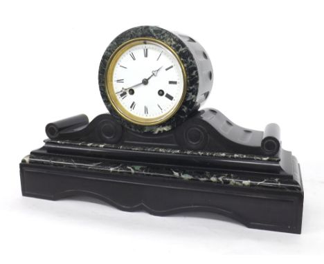 French black slate and green marble drumhead two train mantel clock striking on a bell, the 4.75" dial within a stepped scrol