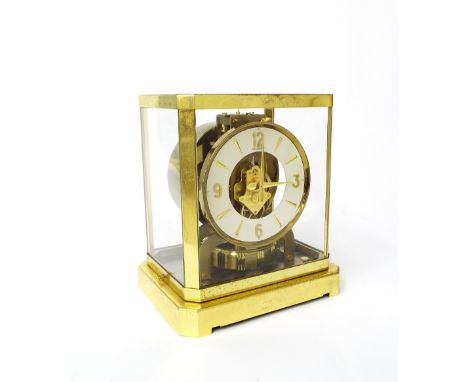 Jaeger LeCoultre Atmos clock, no. 136876, the 4.75" chapter ring enclosing a skeletonised centre and within a glazed brass fr