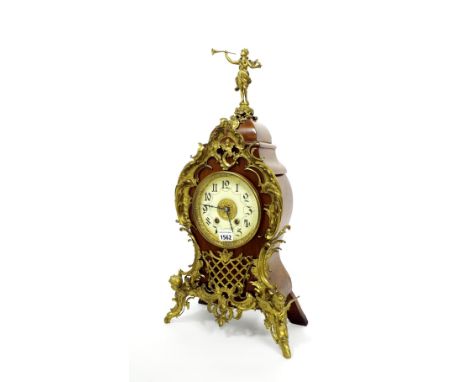 German walnut two train mantel clock, the Lenzkirch movement striking on a gong, the 5" cream dial within a balloon shaped ca