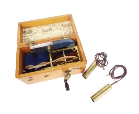 The 'Improved Patent Magneto-Electric Machine for Nervous Diseases', within a light wooden rectangular box with winding handl