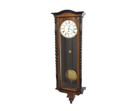 Walnut and ebonised single train Vienna regulator wall clock, the 7" white dial with subsidiary seconds dial, within a bobbin