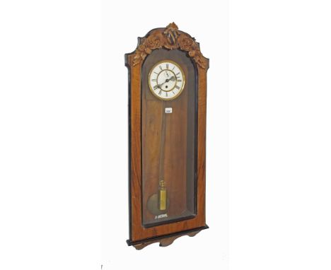 Walnut and ebonised Vienna single weight regulator wall clock, the 6.5" white dial with subsidiary seconds dial, within a gla