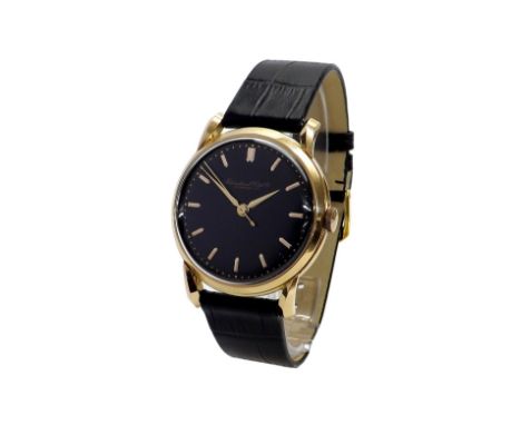 International Watch Co. (IWC) 18k rose gold gentleman's wristwatch, circa 1950s, circular black dial with baton markers and c