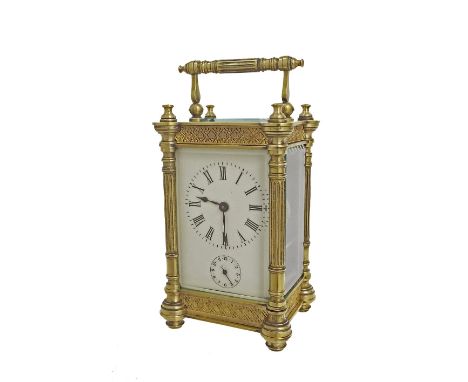 Carriage clock alarm timepiece, within an ornate brass pillared case, 6.5" high