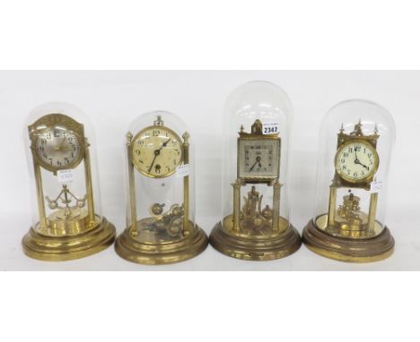 Schatz brass torsion clock, the 2.75" square dial over a ball pendulum and under a glass dome and upon a spun circular base, 