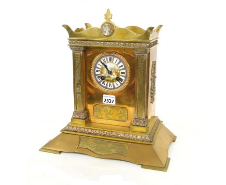 Decorative brass two train mantel clock, the S. Marti movement striking on a bell, the 3.25" porcelain dial within a pillared