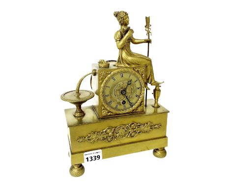 French ormolu mantel clock timepiece, the 2.5" gilt dial inset into a central pedestal and surmounted by a seated peasant lad