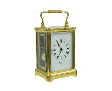 Carriage clock striking on a gong, the white dial signed J.A. Haskell, Ipswich, within a corniche brass case, 7" high 