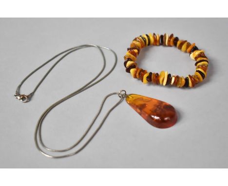 An Amber Chip Bracelet together with an Amber Pendant on Chain 