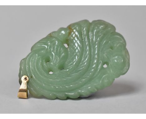 A 9ct Gold Mounted Jade Pendant Depicting Peacock. 6cms Long 