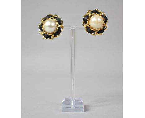 A Pair of 1960s Chanel Clip on Earrings Featuring Large Faux Pearl, Leather and Gold Plated Chain Mount. 