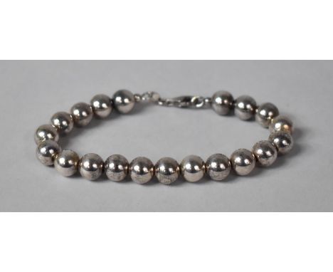 An Italian Silver Bracelet, Formed from Spheres on Chain. 19cms Long 