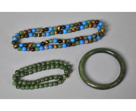 A Collection of Jade and Jadeite Jewellery to include Bangle and Two Necklaces. One Necklace with Additional Tigers Eye, Turq