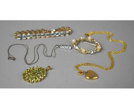 A Gilt Silver and Peridot Pendant, a Gold Filled Heart Shaped Locket on Chain, A Yellow Metal Jewelled Bracelet, a Silver and